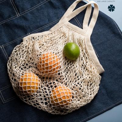 China Durable / Eco-Friendly / Reusable Sustainable Fruits Flower Vegetables Market Shopping Bag 100% Cotton Mesh Tote Bags For Sundries /Food for sale