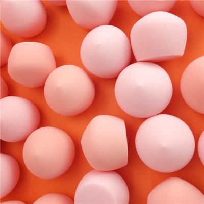 China Expanded In Water Soft Steamed Makeup Tools Marshmallow Makeup Sponge Stuffed Powder Puff And Super Small Roll for sale