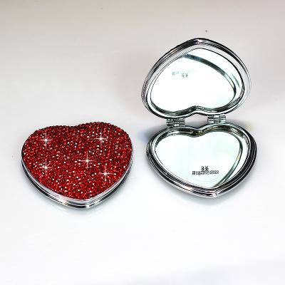 China Portable Double-Sided Mini Pocket Foldable Heart Pink Makeup Tools Crushed Diamond Cosmetic Makeup Mirror for sale