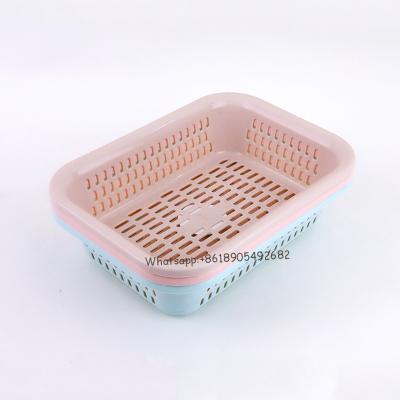 China Sustainable Hollow Plastic Basket Kitchen Storage Plastic Basket for sale