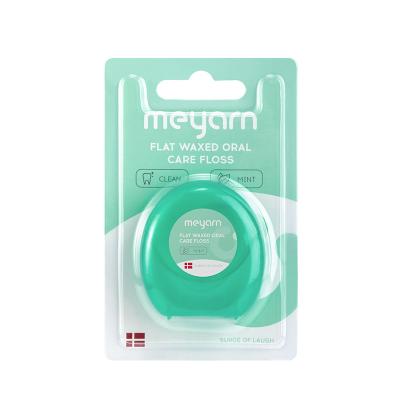 China Meyarn 50m Waxed Flat Waxed Oral Care Floss Custom Logo Waxed Dental Floss for sale