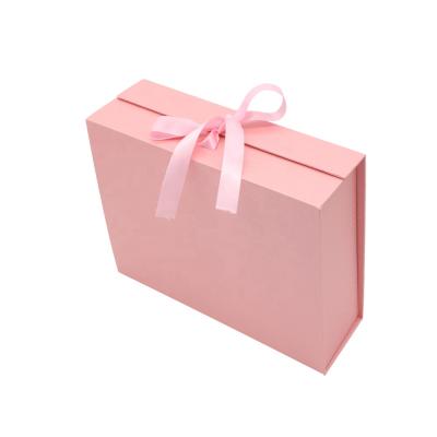 China Biodegradable In Stock Magnetic Collapsible Cardboard Gift Packaging Folding Box With Bowknot For Gift for sale