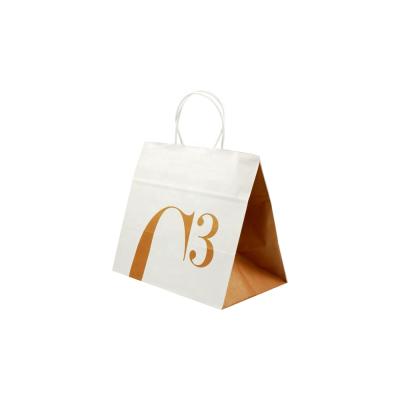 China Logo Print Handle Kraft Small Recyclable Luxury Wedding Paper Gift Packaging Bag Custom for sale