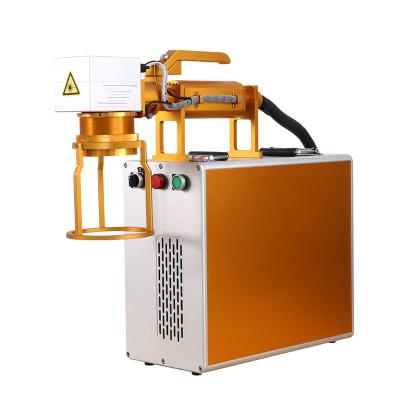 China Automated Loading Handheld Fiber Optic Marking Machine Stainless Steel Metal Marking Machine for sale