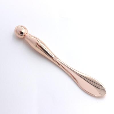 China Zinc Alloy (Gold Plating OEM Face Massager Anti Wrinkle Stick Beauty Stick Eye Massager Tool Eye Cream Spoon for sale