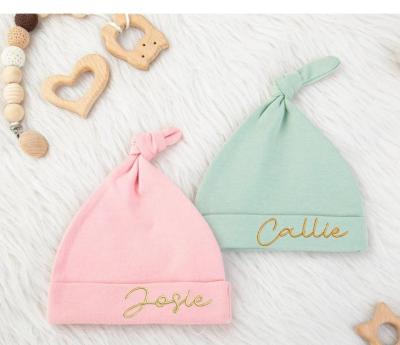 China Custom Character Baby Beanie With Name Embroidered Newborn Hat Tied Baby Hats Baby Shower Gift for sale