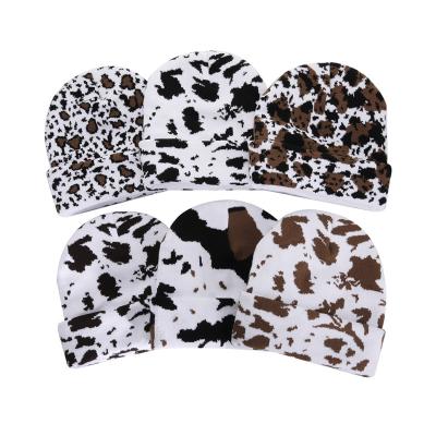 China COMMON Thick Soft Stretch Knock Down Cow Beanie Hat Winter Beanies Cow Knitted Beanies For Women for sale