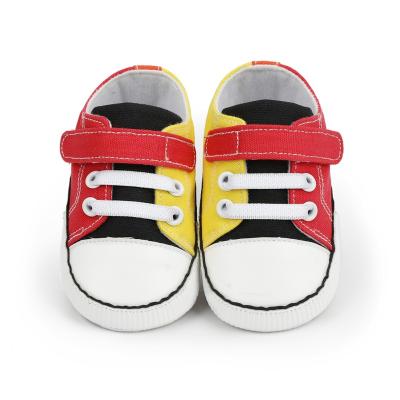 China Flat specialization in manufacturing soft-soled canvas baby shoes, multifunctional solid color sports canvas shoes for sale