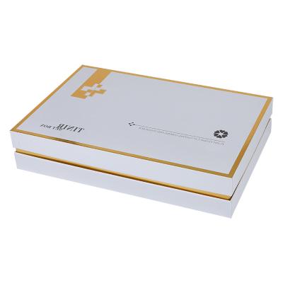 China Disposable custom logo printing OEM skin care paper boxes comestics make up essential oil gift boxes with dividers for sale