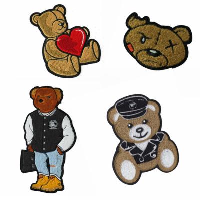 China Viable Chinese Wholesale Customized Embroidery Badges Cartoon Bear Crawler Patches for sale