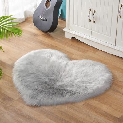 China Washable Super Soft Plush Fabric Faux Sheepskin Heart Shaped Blankets And Rugs For Living Room Home Bedroom for sale