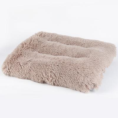 China Travel Pet Supplies Cheap Comfortable Soothing Luxury Fur Fluffy Donut Dog Bed Large Washable Pet Bed For Dogs Wholesale Soft Place for sale