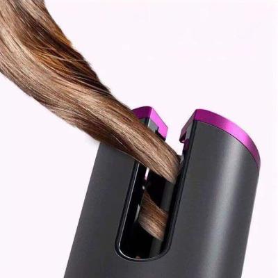 China Portable and Mini USB Rechargeable 5000mAh Portable Wireless Ceramic Mini Automobile Magic Hair Curler Rotating Hair Curler Set for sale