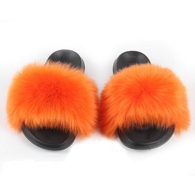 China Fashion Trend Custom LOGO Indoor EVA Sole Racoon Fur Sides Large Size Faux Fur Slippers For Women for sale