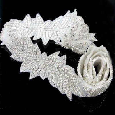 China Wholesale Handmade Beaded Hot Fix Rhinestone Bridal Applique Trim Shiny Iron On Chain Crystals For Wedding Dress Sash for sale