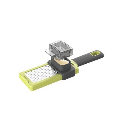 China Viable Cutter Plastic Garlic Slicer Ginger Garlic Grinding Grater Planer Tool Kitchen Grinding Accessories for sale