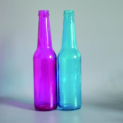 China Beverage 330ml Long Clear Neck Glass Beer Soda Bottle With Metal Crown Screw Cap for sale