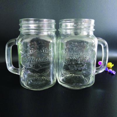 China Sustainable hot sale cheap machine made clear 600ml glass mason jar with handle for sale