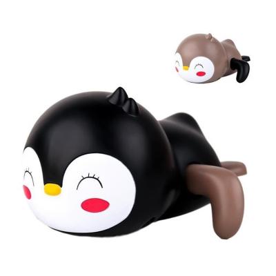 China Bath Toy Swimming Penguin Water Playing Penguin Black Brown Bathroom Water Playing Chain Cartoon Wind-Up Animal Water Playing Toy for sale