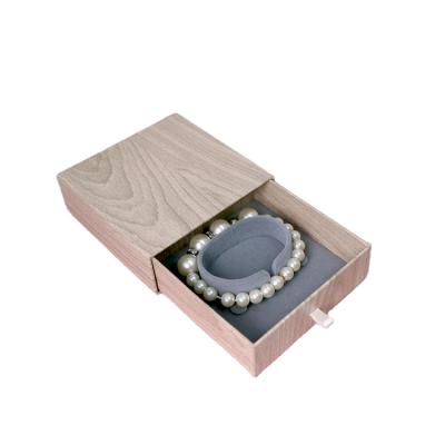 China Fashion simple style Gray Plush Lining Bangle Jewelry Paper Logo Wrap Beige Wood Grain custom box for sale