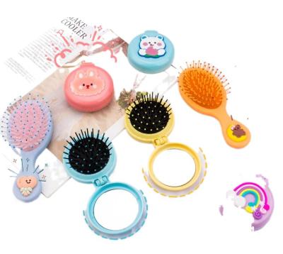 China Soft Synthetic Hair 1 Pcs Portable Lovely Girls Comb Mini Folding Comb Airbag Massage Travel Oval Hair Brush With Round Anti-Static Makeup Mirror for sale