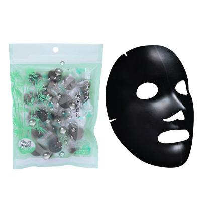 China Pore ​​Remover Charcoal Bamboo Fiber 100pcs Compressed Face Mask Diy Facial Paper Skin Care Face Mask for sale