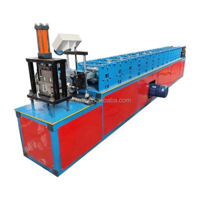 China Hotels Shutter Guide Rail Roller Shutter Door Slat Door Guide Steel Channel Roll Forming Machine for sale