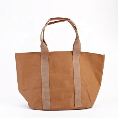 China Fashion Shopping Tote Bag Washable Kraft Paper Handled High Quality Waterproof Handbag for sale