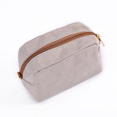 China Eco-friendly Custom Washable Kraft Paper Zipper Bag Travel Makeup Cosmetic Paper Bag for sale