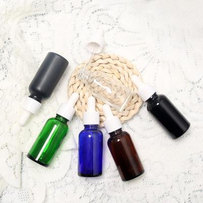 China Cosmetic Clear Matte Frosted Black Amber Green 5ml 10ml 15ml 20ml 1oz 2oz 3oz Essential Oil Serum Bottle Colored Glass Dropper Bottles for sale