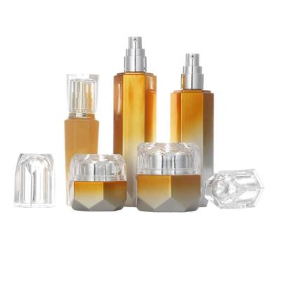 China Personal Care Orange Empty Packaging 30ml 60ml 100ml 120ml Recyclable Cosmetic Lotion Bottles With Double Sliver Glass Screw Caps for sale