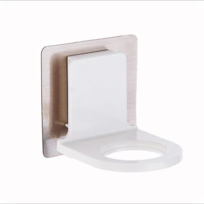 China Modern New Style Self Adhesive Plastic Wall Mounted Shampoo Shower Gel Holder Rack for sale