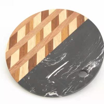 China New Function Design Grain End Feacture Viable High Headroom Cost Effective Color Heat Insulated Wood Round Walnut Cutting Board for sale