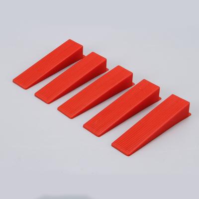 China Jnz 100pcs/bag modern tile leveling system leveling wedges tile spacers for flooring wall tile leveling system for sale