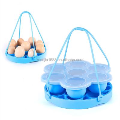 China Manjia Viable Customized Multi Functional Portable Silicone Egg Steamer Kitchen Instrument Boiled Cook Chicken Egg Basket Rack for sale