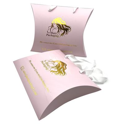 China Custom Materials Logo Pink Pillow Box Recycled Foldable Hair Extension Packaging Packaging With Handle Paper Wig Bag for sale