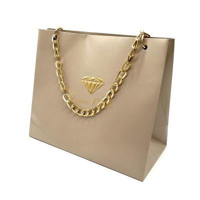 China Recyclable Custom Shopping Bags With Crocodile Skin Texture , Hand Paper Bag With Gold Embossing Logo for sale