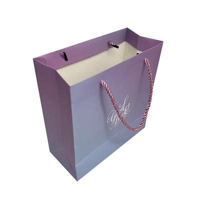 China Luxury Custom Logo Gradient Ramp Card Board Art Paper Bag Cardboard Paper Gift Bag Recyclable With Handles for sale