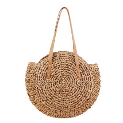 China New Straw Woven Beach Fashion Women Simple Round One-shoulder Armpit Tote Bag for sale