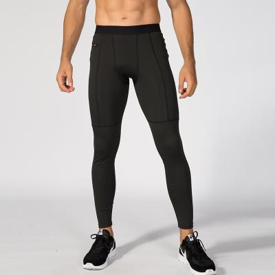 China Anti-wrinkle men's zippered pocket exercise pants for sale