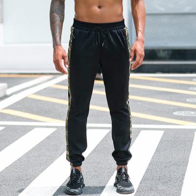 China Anti-wrinkle Mens Running Sweatpants Fitness Camouflage Training Pants for sale