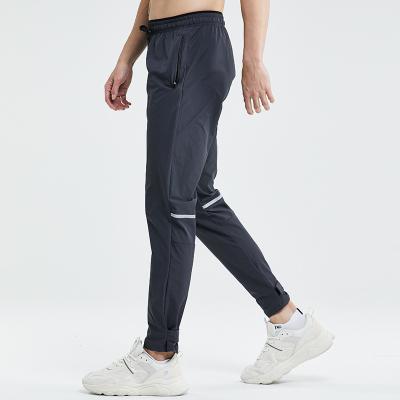 China Breathable Lightweight Sweatpants With Reflective Brand Outdoor Men Jogger Track Pants for sale