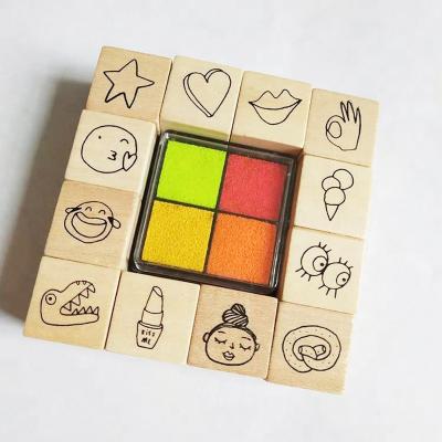 China Office 12 Pcs Wooden Rubber Diary Stamps With Four Colors Ink Pads For Baby for sale