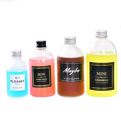 China Large Beverage Belly Round 250ml 500ml 1000ml Boston Beverage Juice Sauce Kombucha Glass Bottle for sale