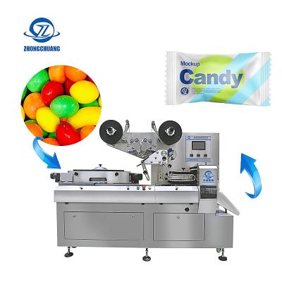 China High Speed ​​Automatic Doypack Servo Rotary Pillow Granule Packing Machine Hard Candy Production Filling Packing Line for sale