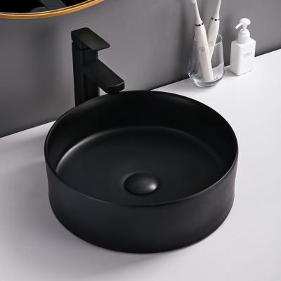 China Bathroom Sanitary Modern Matte Black Ceramic Sink Hand Basin Vessel Sink Round Countertop Lavatory Sink Ware for sale