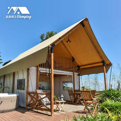 China Waterproof Large Pole Glamping Two Storey Outdoor Hotel Safari Luxury Tent Living Waterproof Wooden Luxury Resort Tent for sale