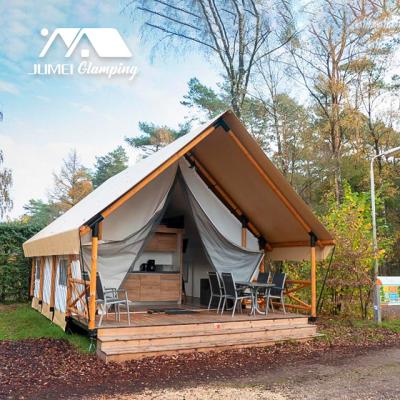 China New Design Waterproof Wooden Tent Outdoor Luxury Glamping Safari Desert Hotel Resort House Tents With Wooden Platform for sale