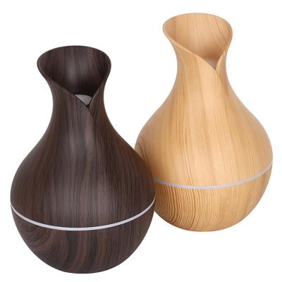 China USB Car Vase Humidifier Small Air Purifier Aromatherapy Grain Silent Home Rechargeable Wooden Vase Humidifier for sale