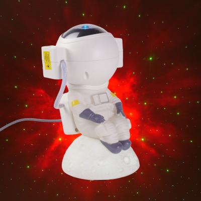 China Modern Cute Star Projector Astronaut Night Light Rotating Led Galactic Baby Projector Desk Lamp for sale